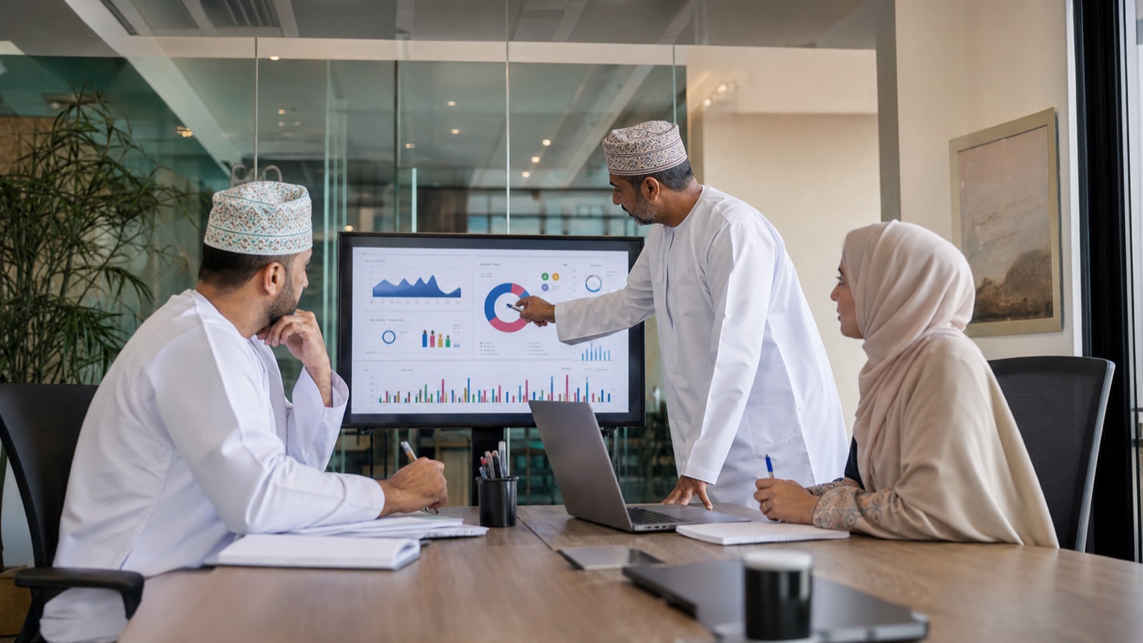 Marketing and sales professionals reviewing shared CRM lifecycle metrics